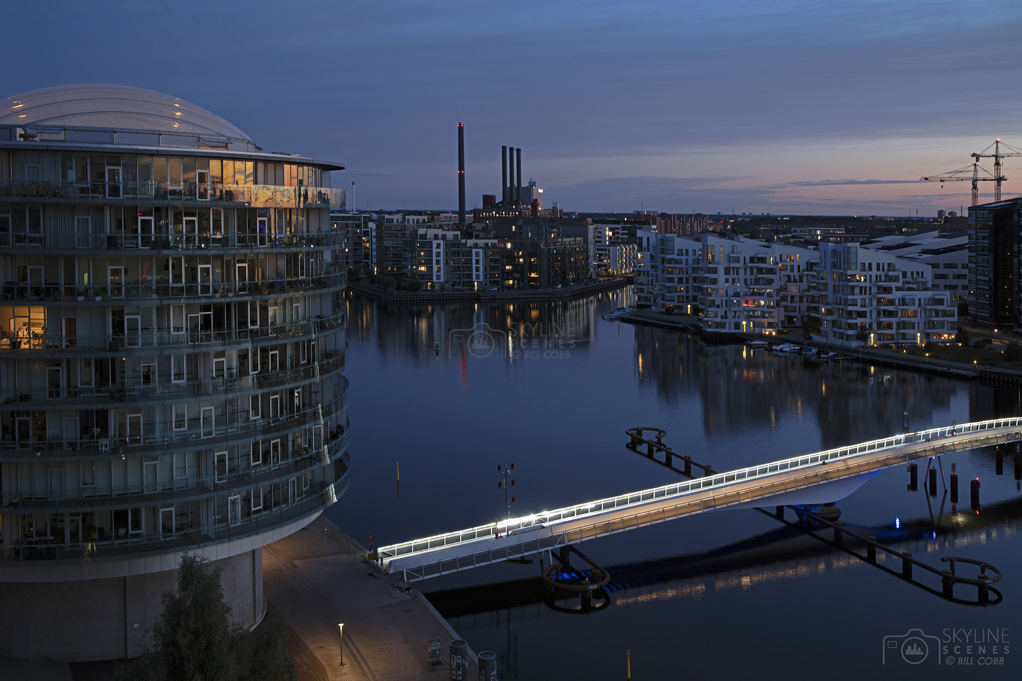 The Bryggebroen or Quay Bridge in Copenhagen at sunset images for sale by Skylinescenes.